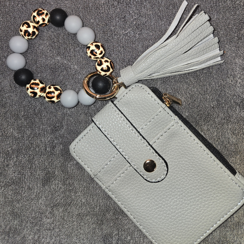 Elegant Cream Wristlet with Tassel